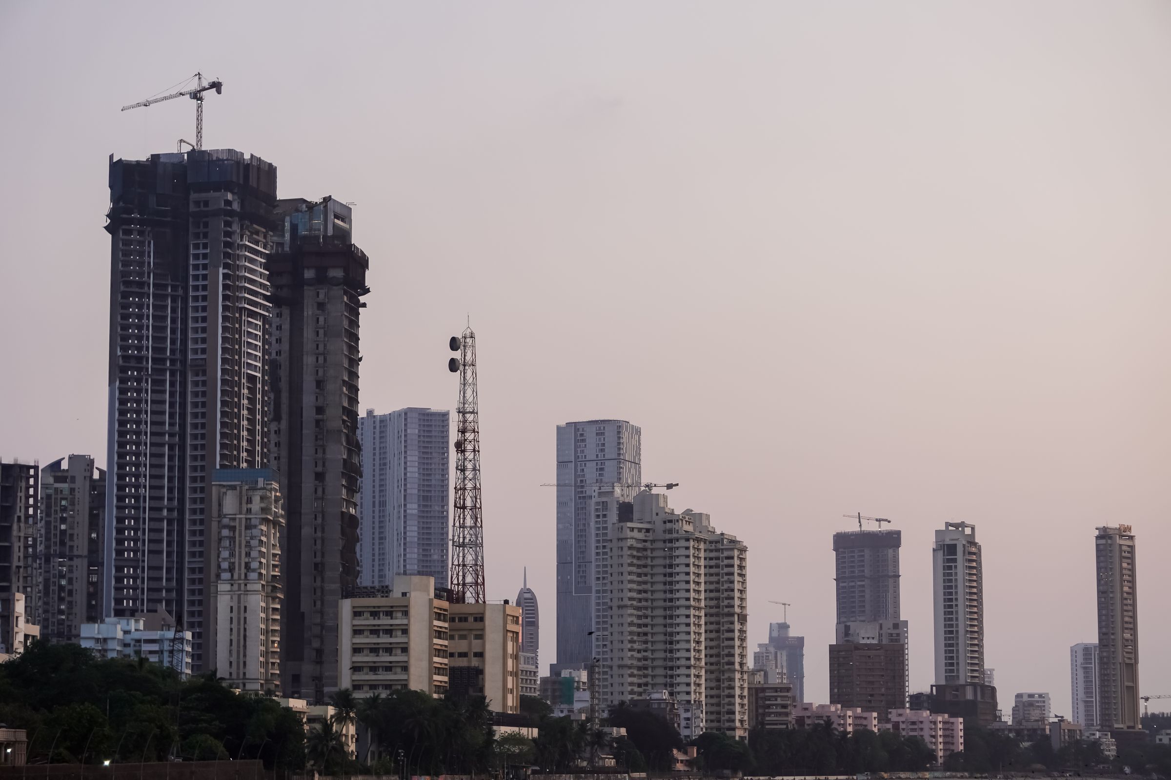 City skyline at dusk, representing business growth in India